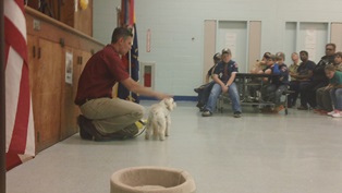 Dr. Joe Martins, DVM, petting Peanut